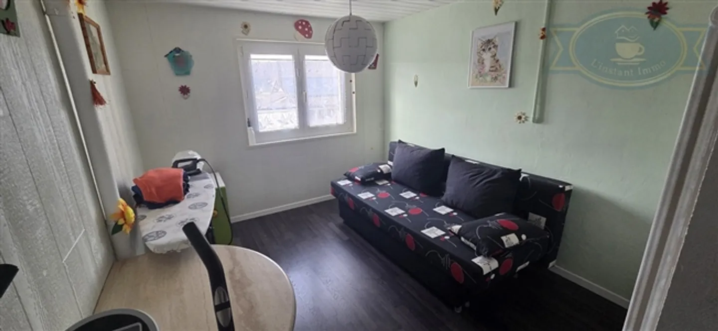 Maison spacieuse avec vue dégagée et grand terrain à Coeuve - Photo 11 sur 15