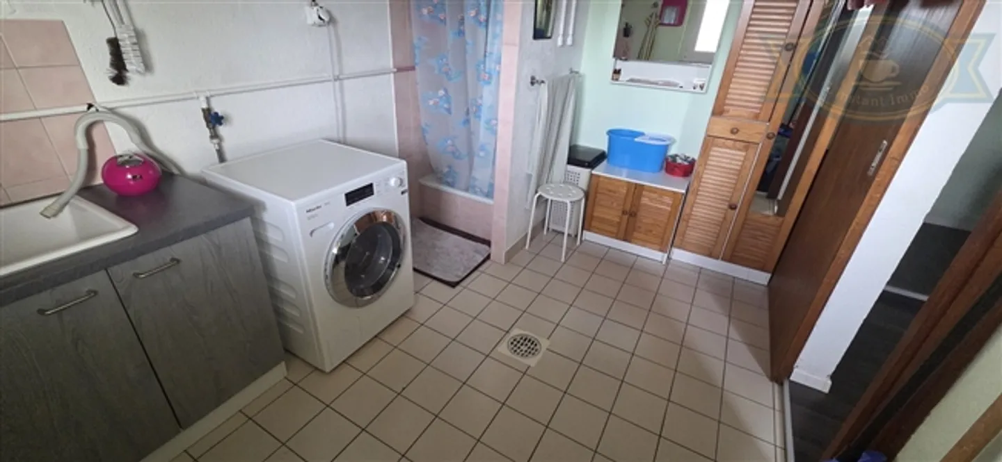 Maison spacieuse avec vue dégagée et grand terrain à Coeuve - Photo 12 sur 15