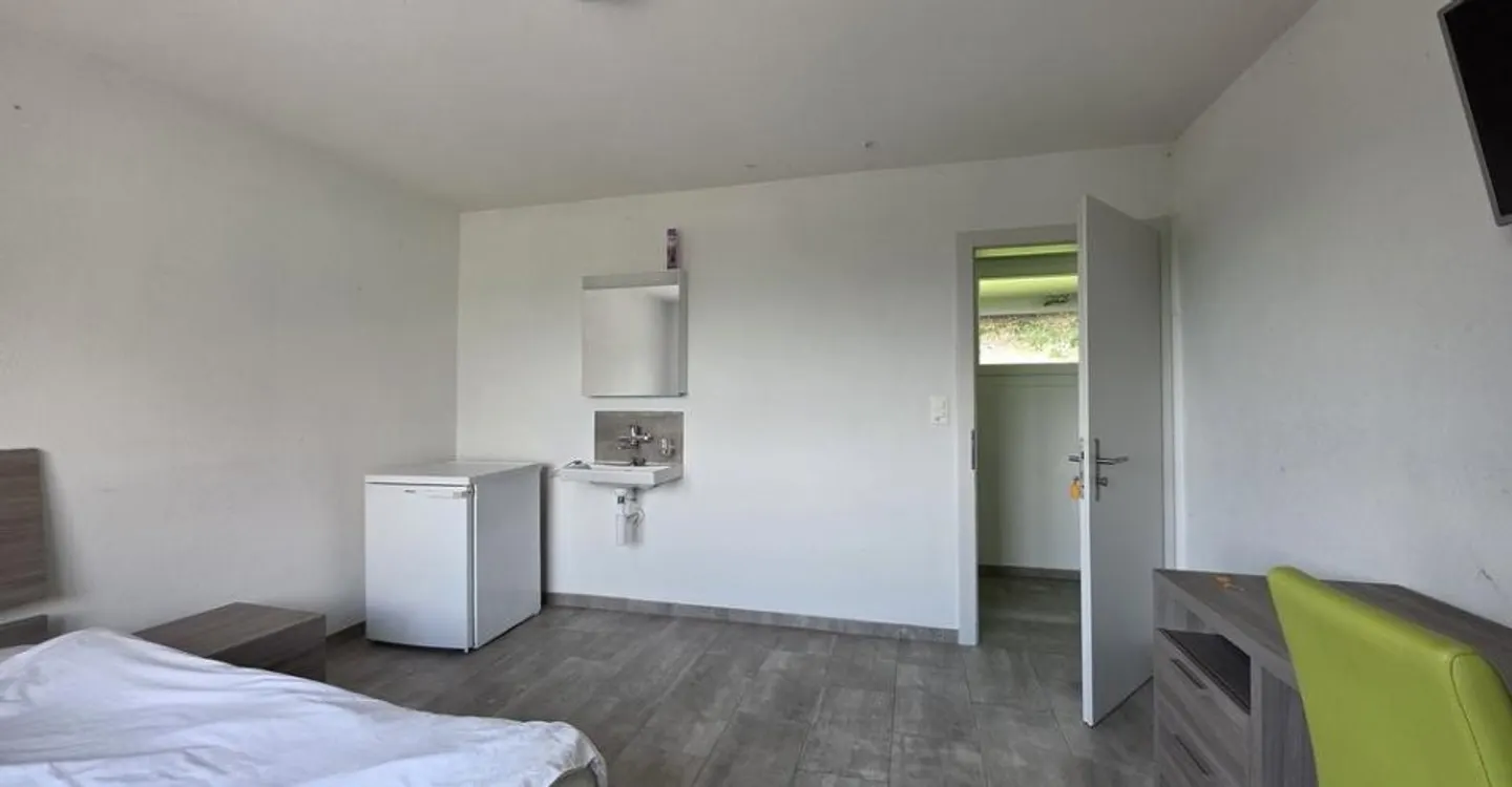Einzelzimmer zur Miete in St-Blaise - Foto 1 von 7