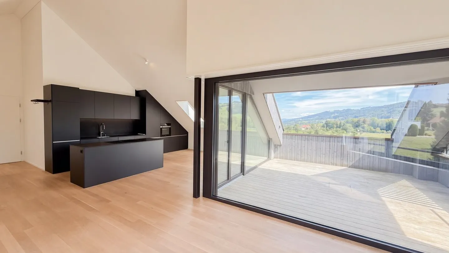 Elegante 3.5-Zimmer-Dachwohnung mit Seesicht in Mörschwil - Photo 1 of 11