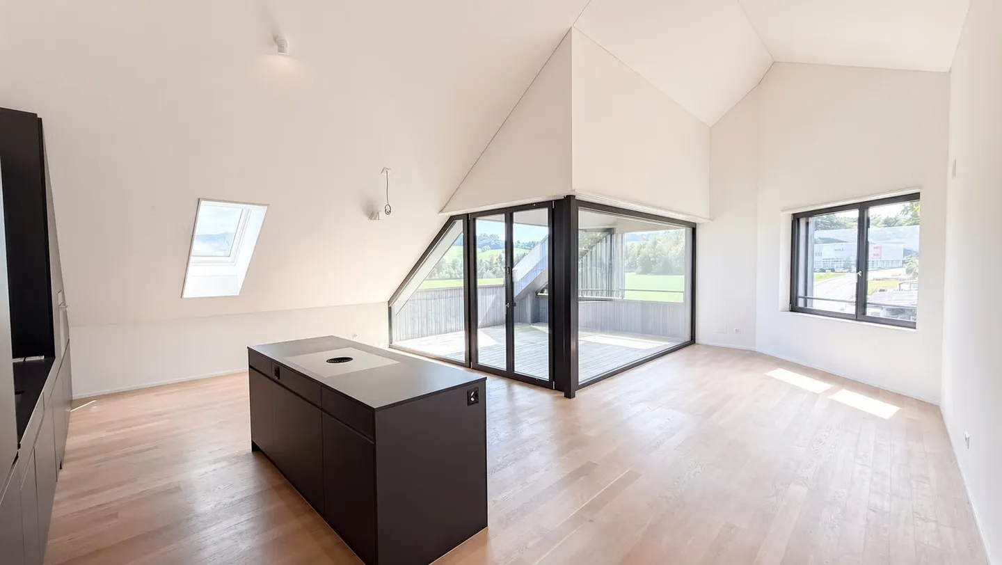 Elegante 3.5-Zimmer-Dachwohnung mit Seesicht in Mörschwil - Photo 3 of 11