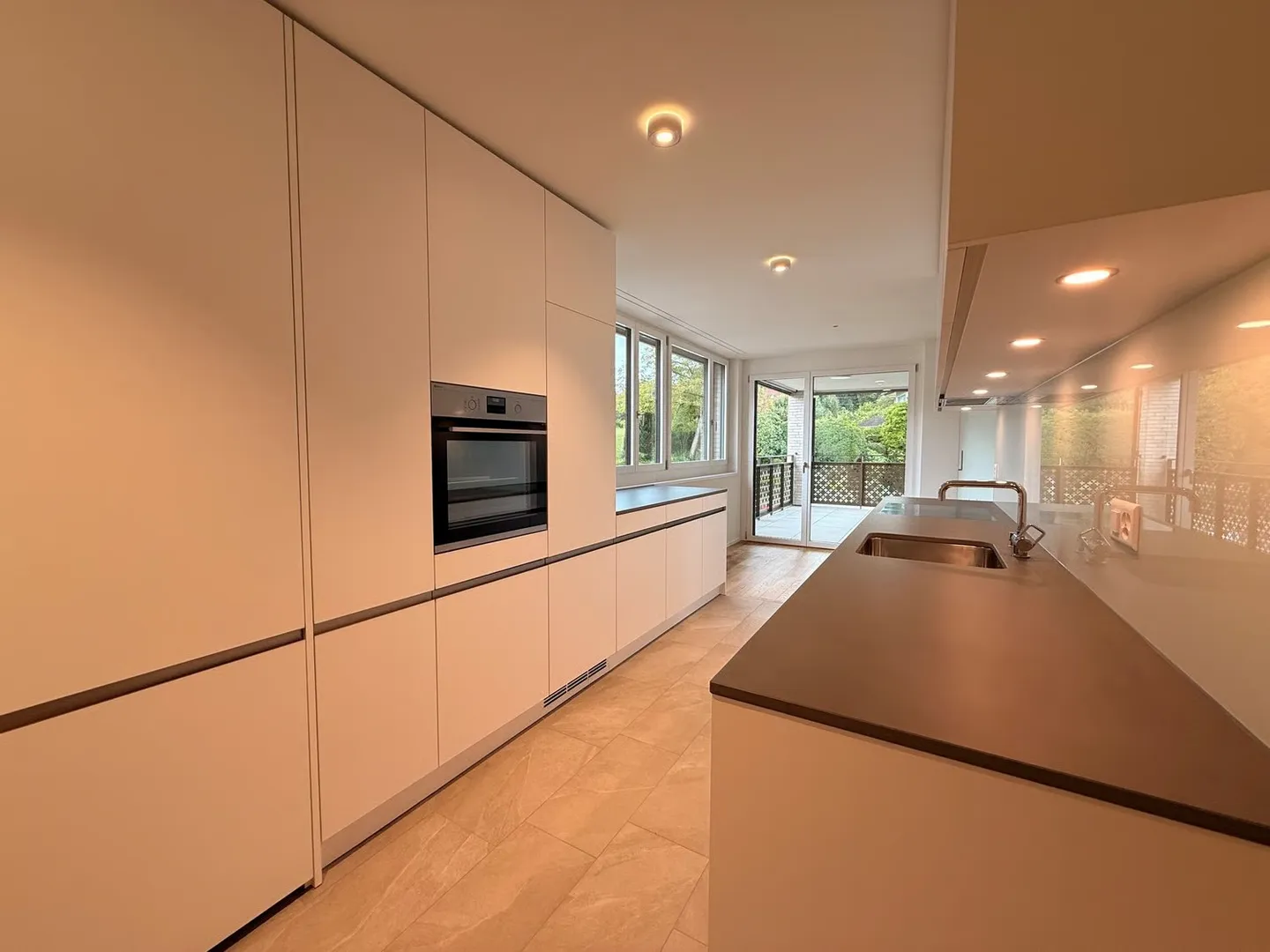 Beautiful 3.5-room garden apartment in Rümlang – stylish new building with high living comfort - Photo 3 of 10