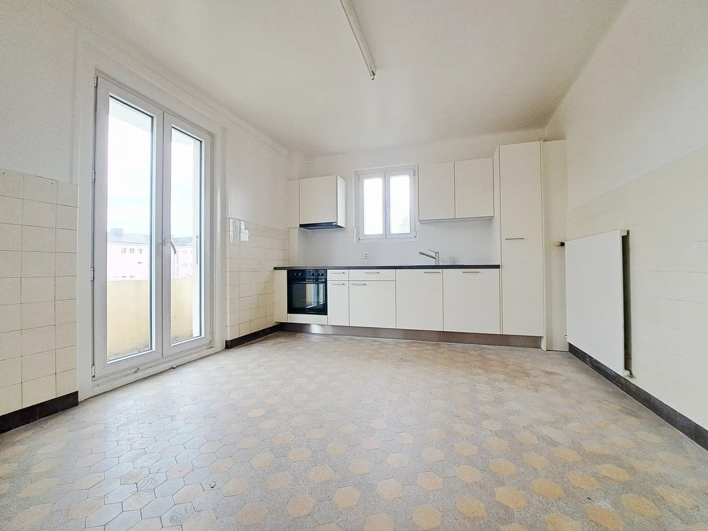 THIENE 5, Appartamento di 3.5 locali con cucina ristrutturata - Foto 1 di 11