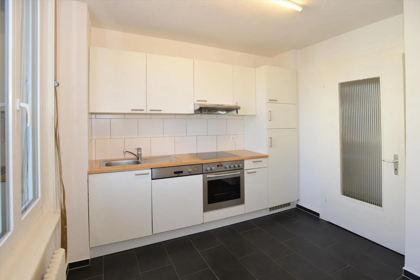 Appartement Charmant avec Cuisine Moderne - Photo 6 sur 11
