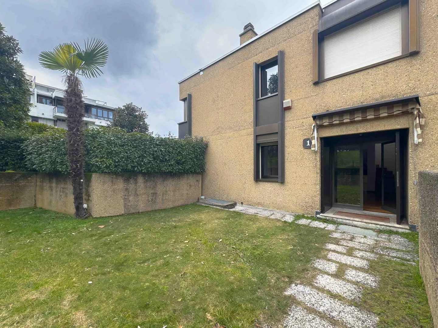 Duplex con giardinetto privato a Collina d’Oro - Foto 5 di 12