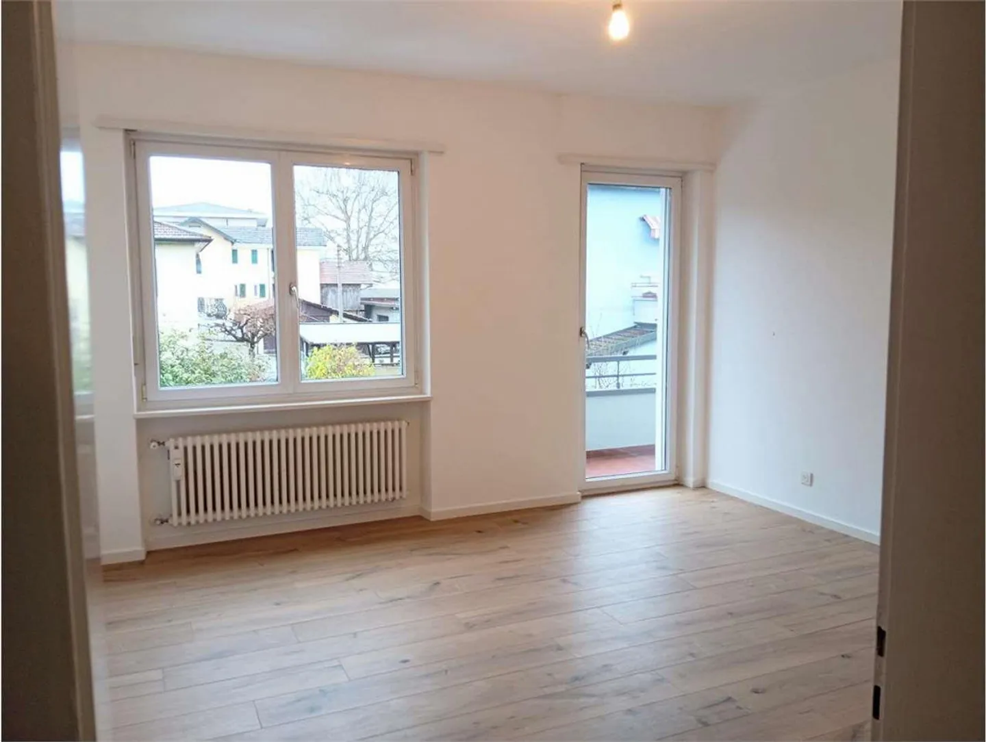 BRIGHT 4.5-ROOM APARTMENT WITH GARDEN IN COLDRERIO - Photo 3 of 10