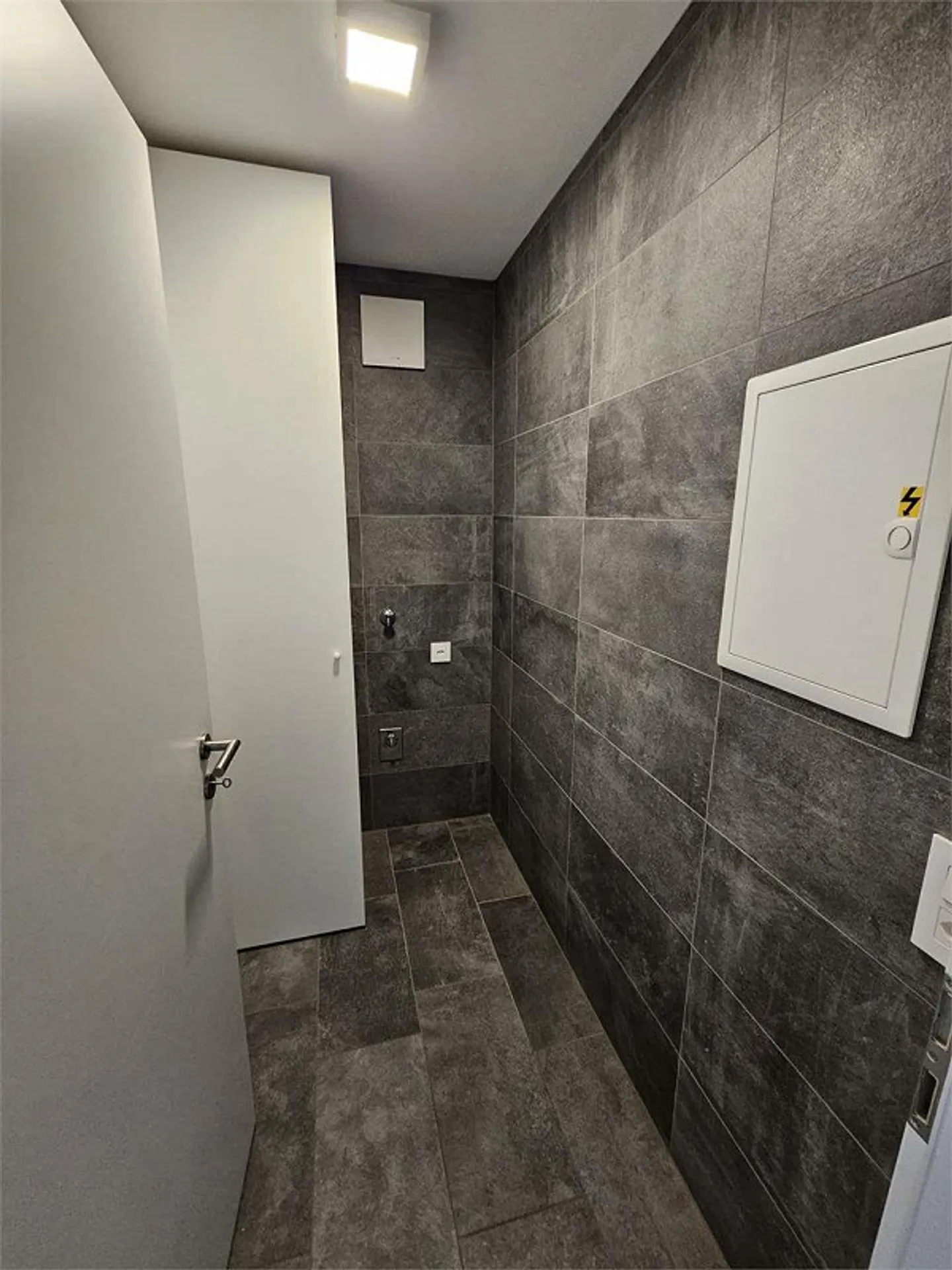 Geräumige Wohnung mit Terrasse - Foto 9 von 13