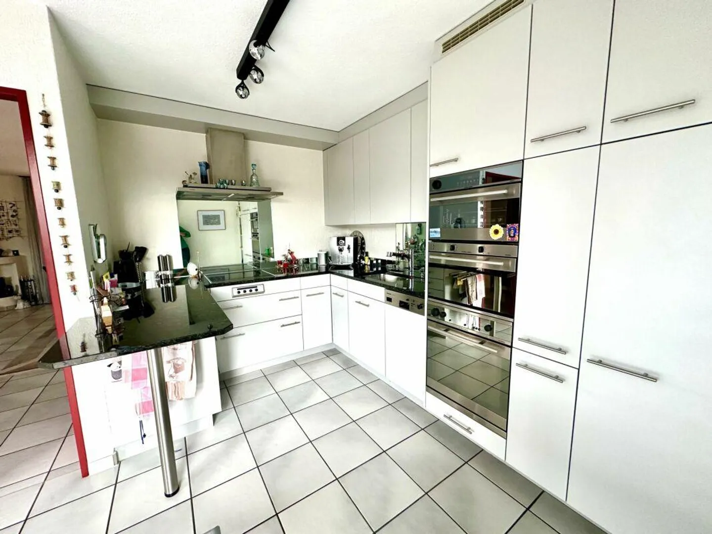 Maison individuelle de 5,5 pièces avec système PV - Photo 4 sur 12