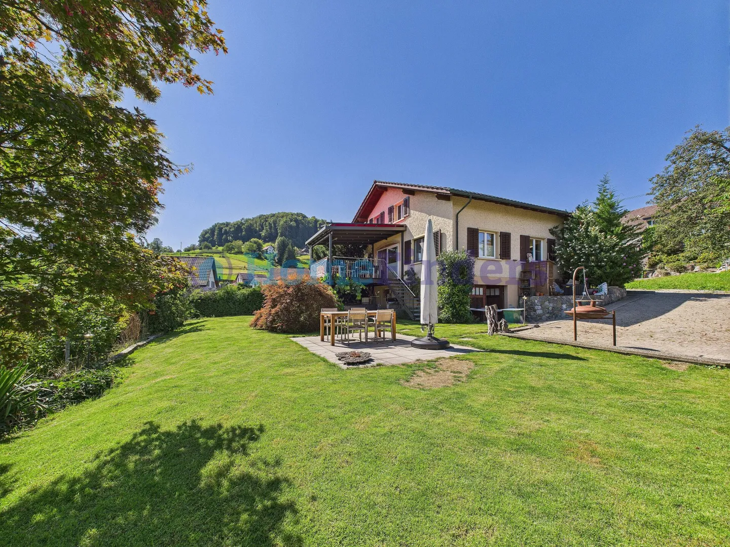 RENOVATED WITH SUNNY GARDEN AND ALPINE VIEW! - Photo 1 of 11
