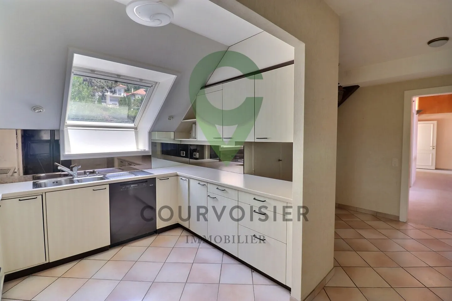 PENTHOUSE APARTMENT WITH UNOBSTRUCTED VIEW OF THE LAKE AND ALPS - Photo 11 of 13