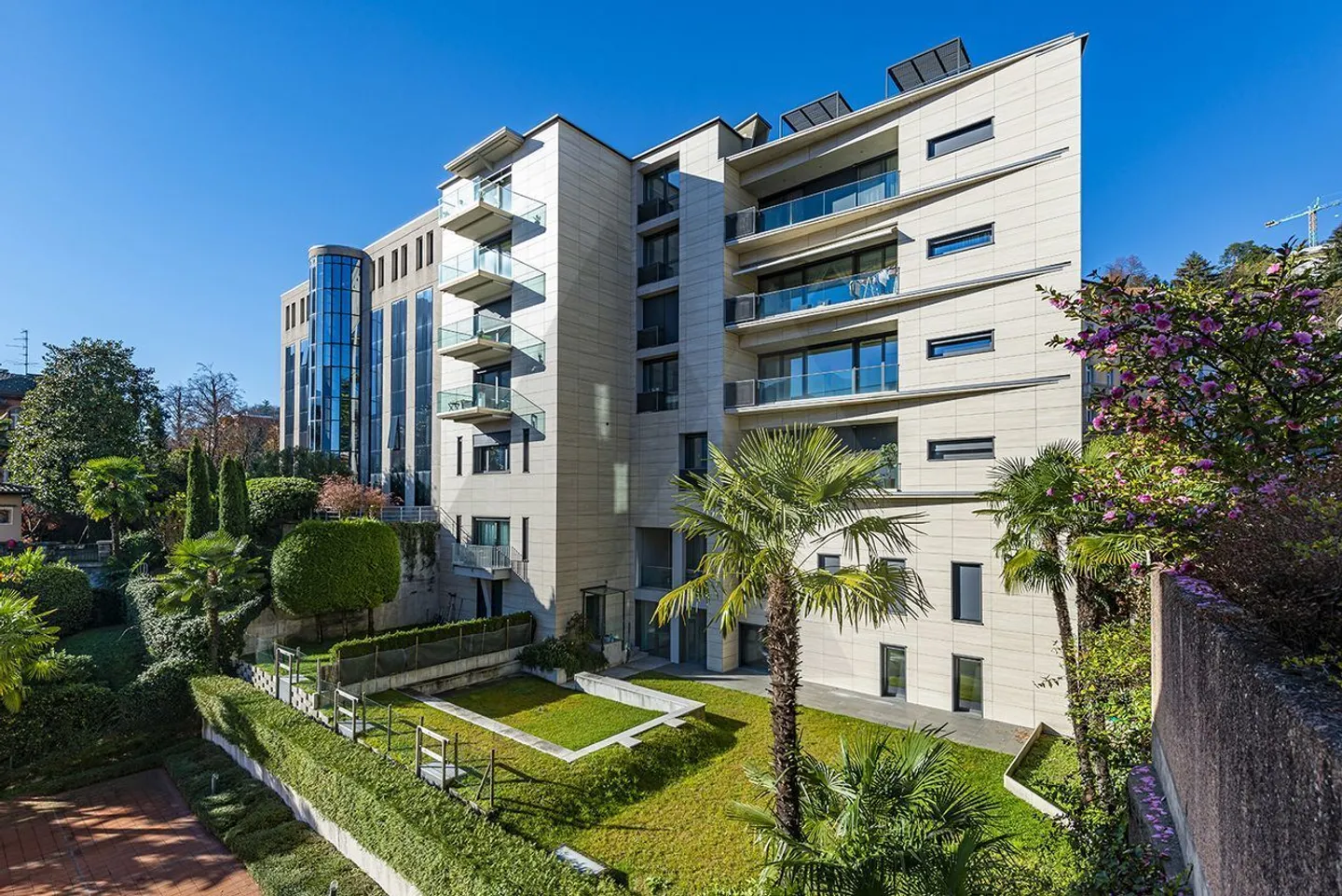 NEUE 2,5-ZIMMER-WOHNUNG MIT GARTEN IN LUGANO - Foto 1 von 8