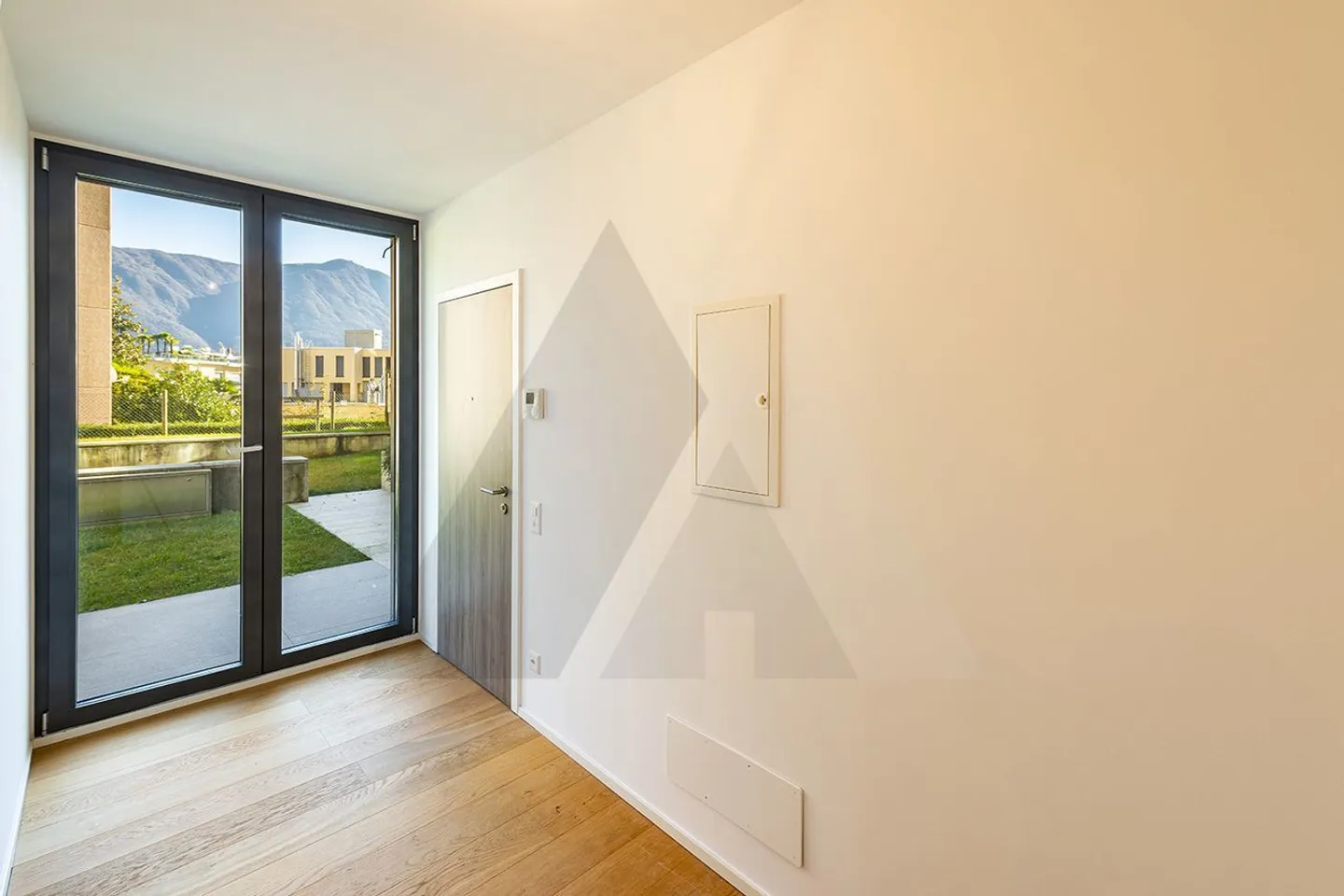NEUE 2,5-ZIMMER-WOHNUNG MIT GARTEN IN LUGANO - Foto 8 von 8