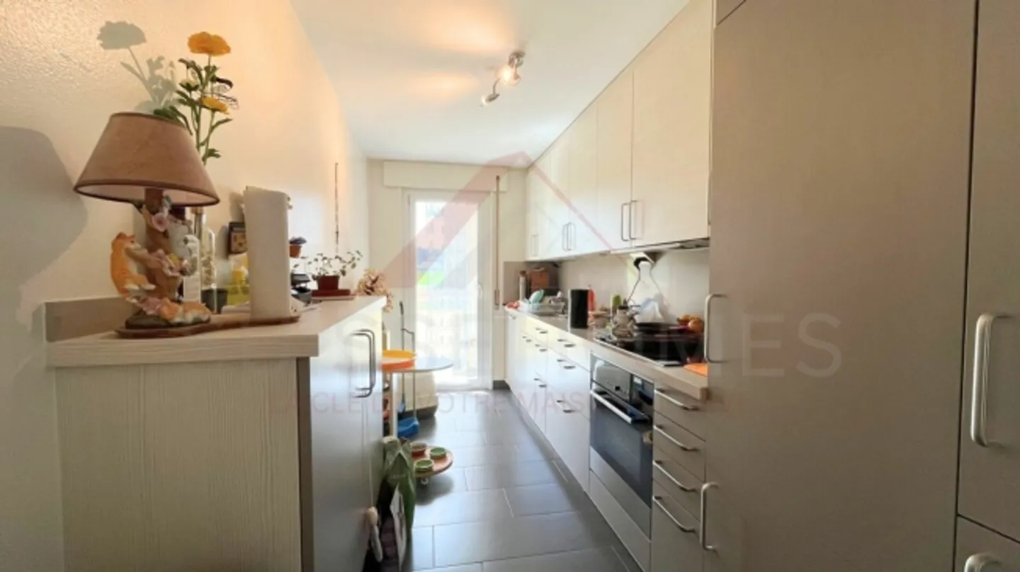 Le Locle - appartamento luminoso con loggia chiusa, giardino comune e vista panoramica - Foto 4 di 11