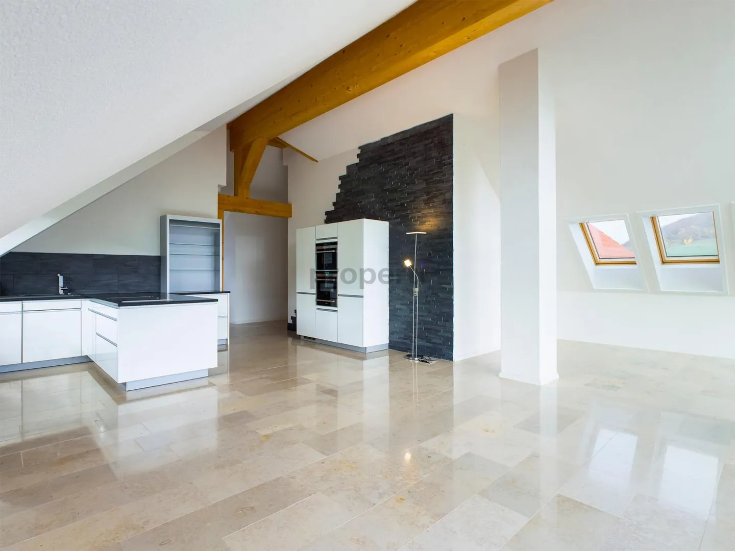 Light-Filled Dream Home in Weiach: Stylish 3.5-Room Attic Apartment with High Ceilings and Great Views - Photo 5 of 13