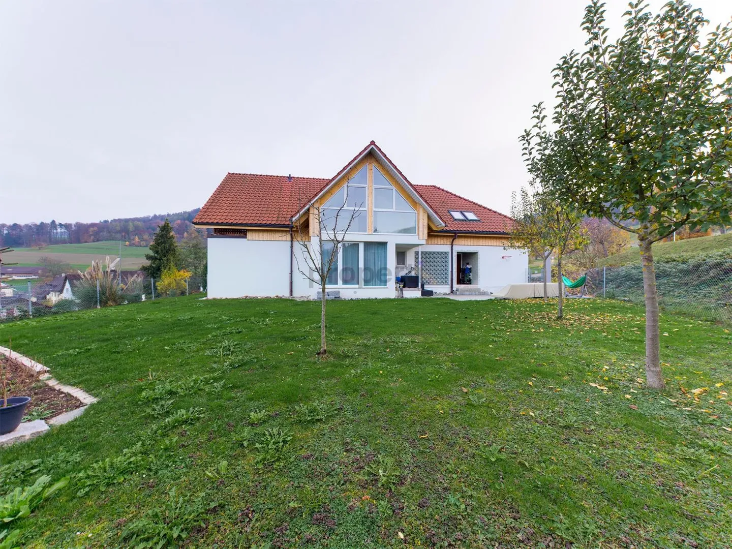 Light-Filled Dream Home in Weiach: Stylish 3.5-Room Attic Apartment with High Ceilings and Great Views - Photo 1 of 13