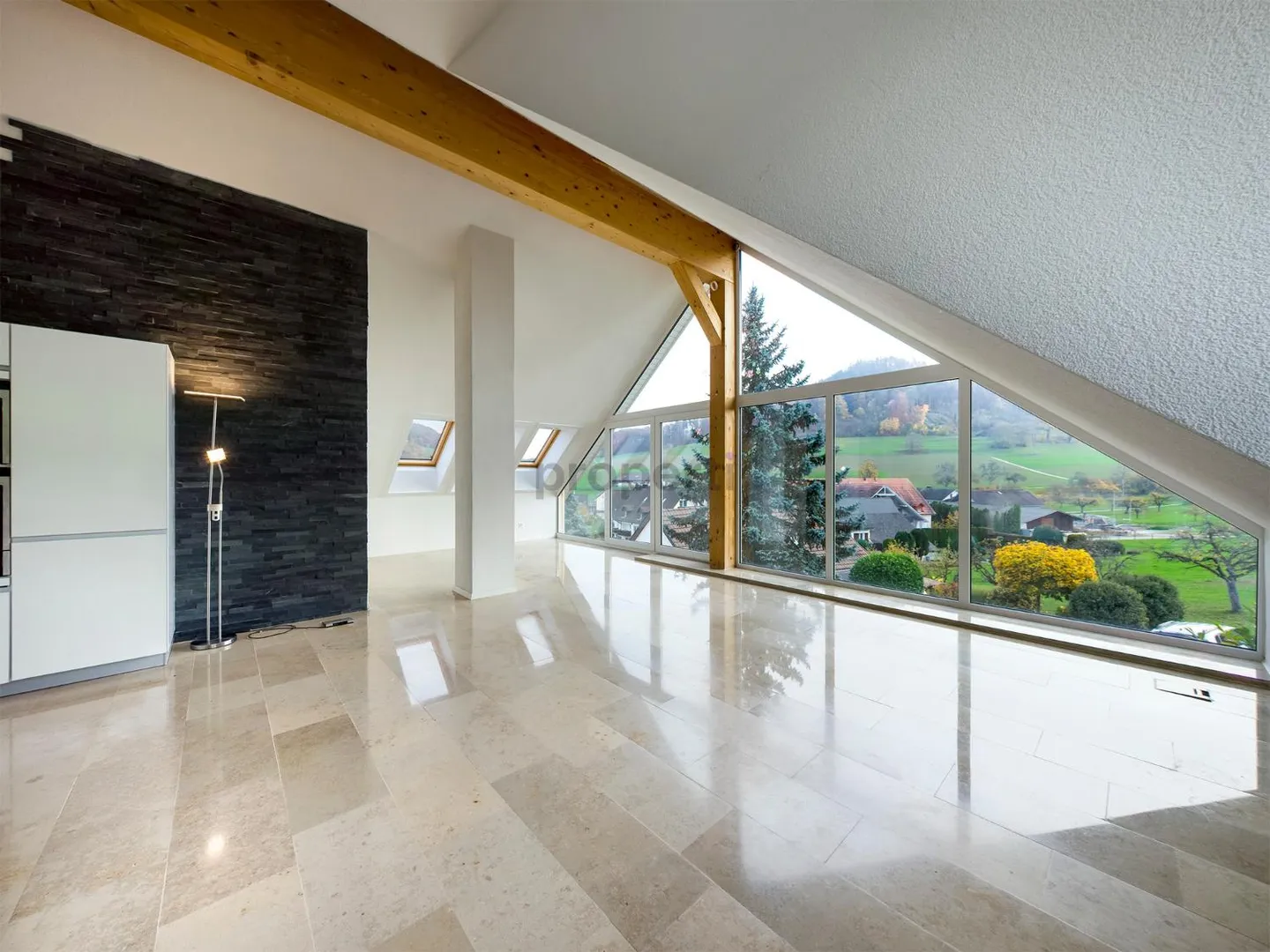 Light-Filled Dream Home in Weiach: Stylish 3.5-Room Attic Apartment with High Ceilings and Great Views - Photo 7 of 13