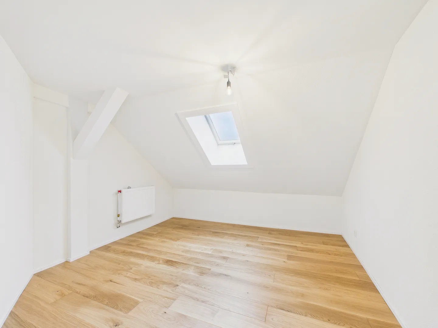 Première location - Appartement en duplex de 4,5 pièces avec 3 places de parking extérieures à Rietheim - Photo 9 sur 11