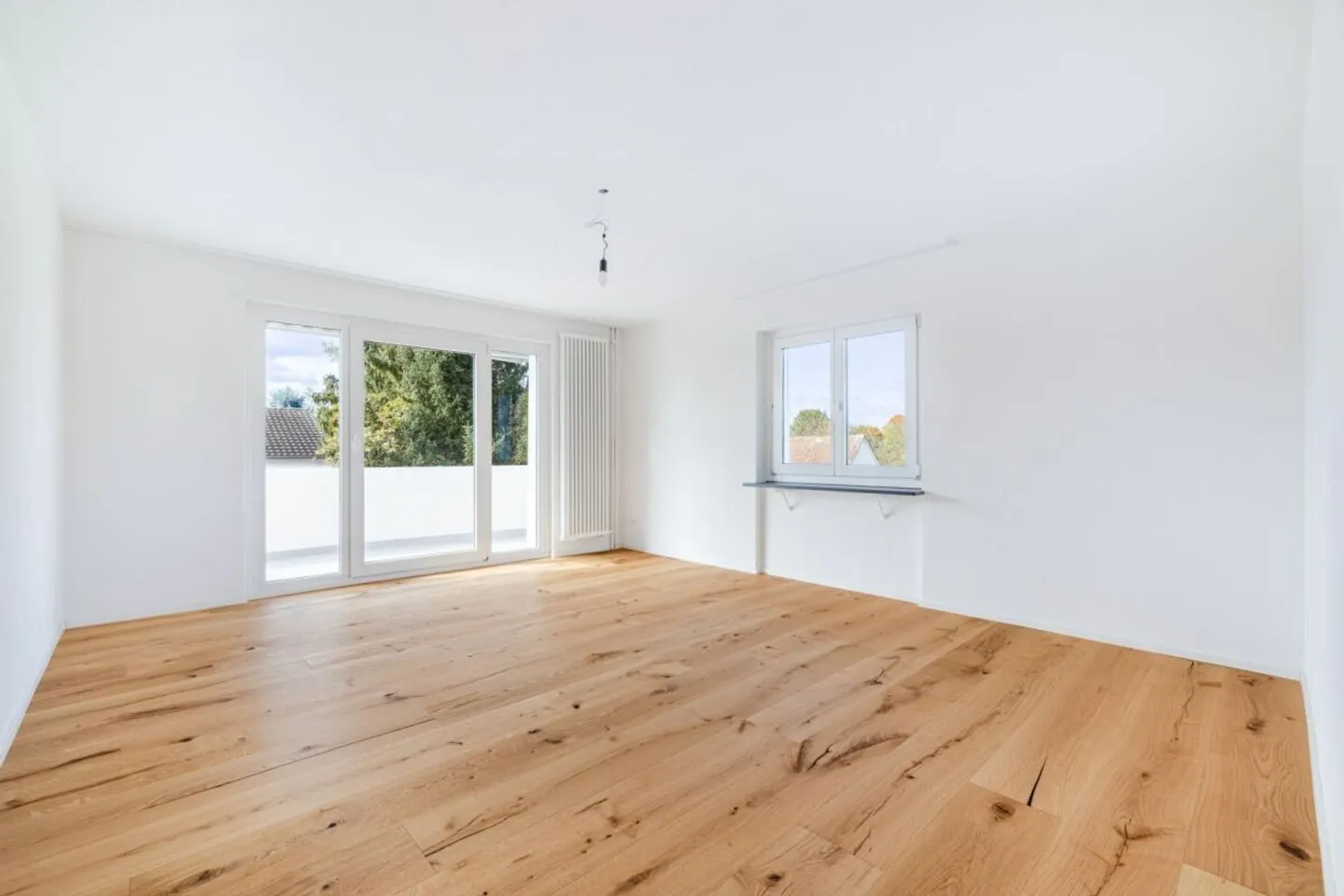 Prima occupazione dopo ristrutturazione totale: Moderno appartamento di 4 stanze in una posizione tranquilla e soleggiata con garage singolo - Foto 4 di 13
