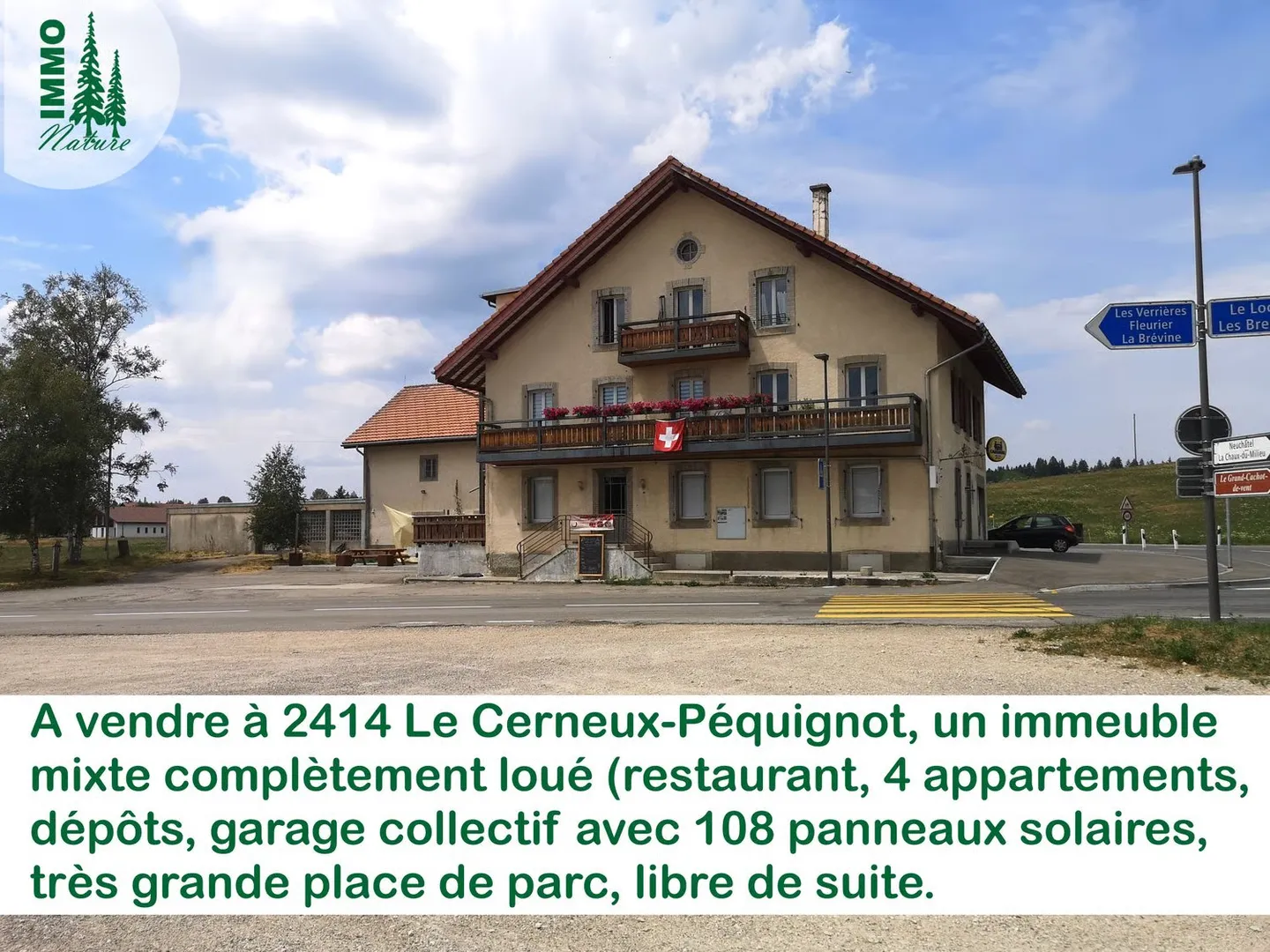 Edificio misto con ristorante, 4 appartamenti, depositi, garage collettivo, pannelli solari - Foto 1 di 9