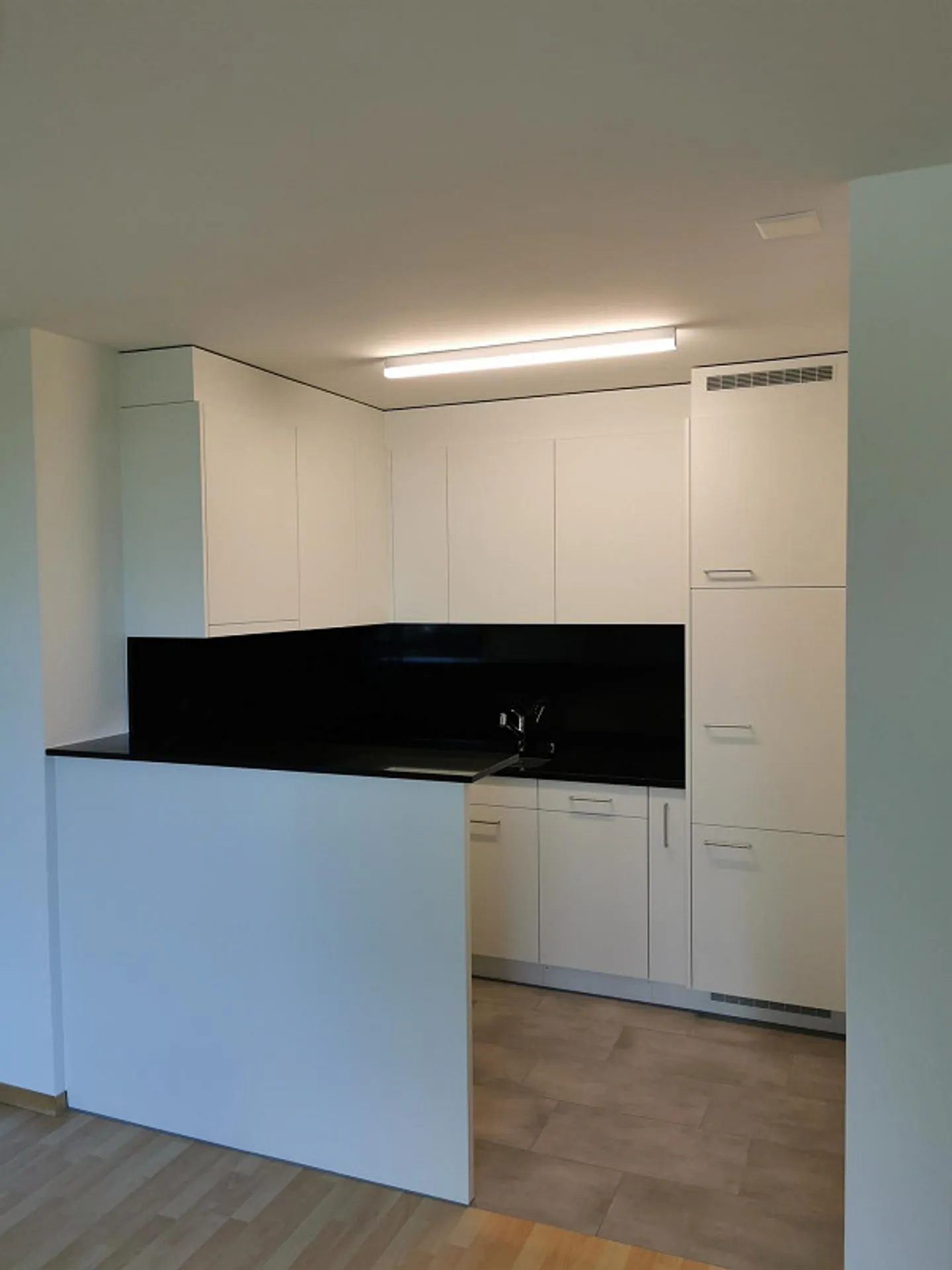 Appartement 2 1/2 pièces Rez-de-chaussée H1-27 - Photo 2 sur 6