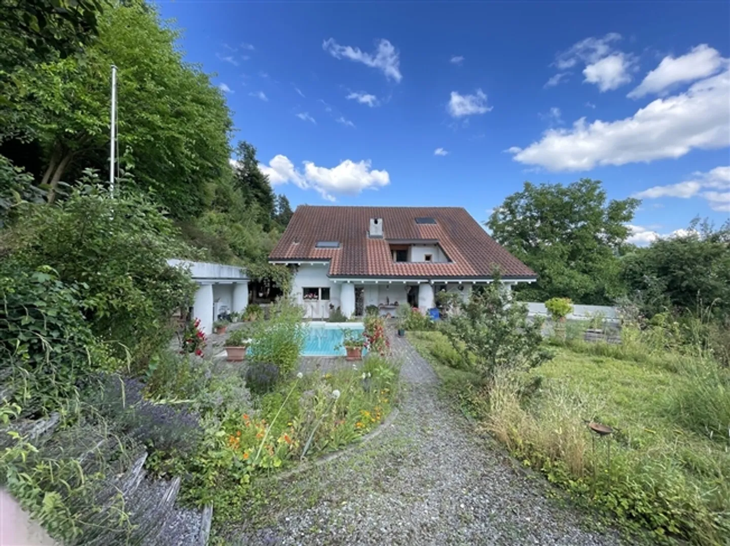 Vivre avec cœur et caractère – Maison individuelle avec espace commercial - Photo 10 sur 14