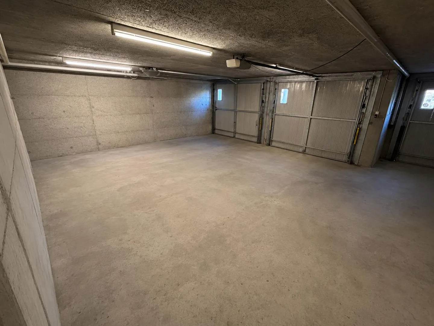 Spacious Garage / Storage Room (3 Garage Doors/Parking Spaces) - Photo 1 of 4
