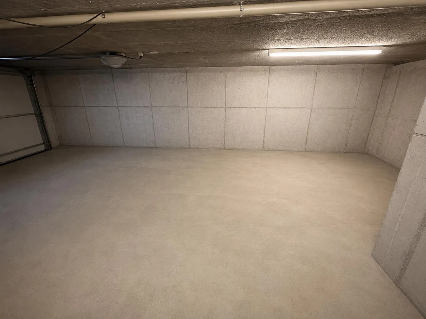 Spacious Garage / Storage Room (3 Garage Doors/Parking Spaces) - Photo 2 of 4