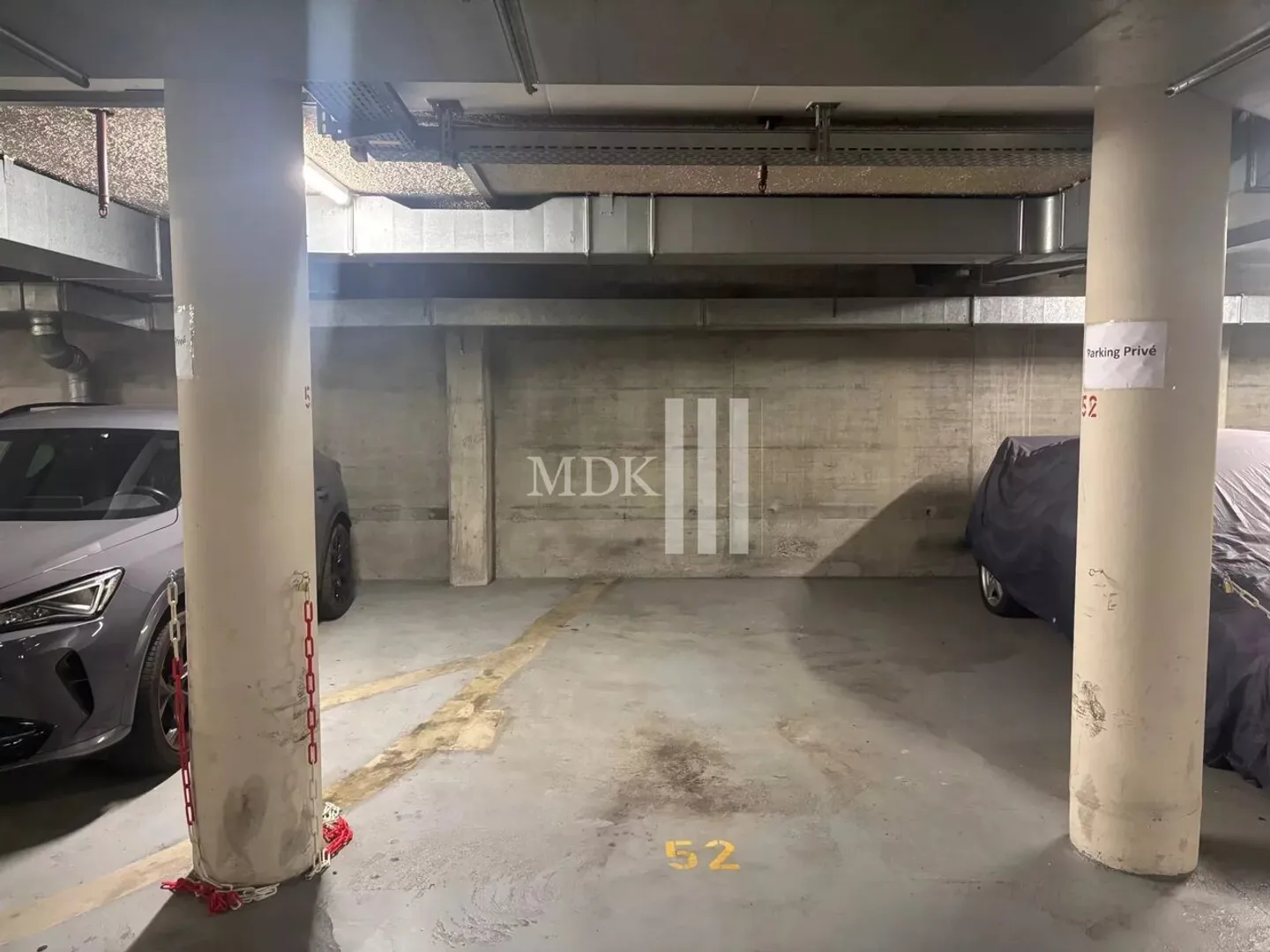 Zwei Innenparkplätze zur Miete im Stadtzentrum von Monthey - Foto 1 von 2