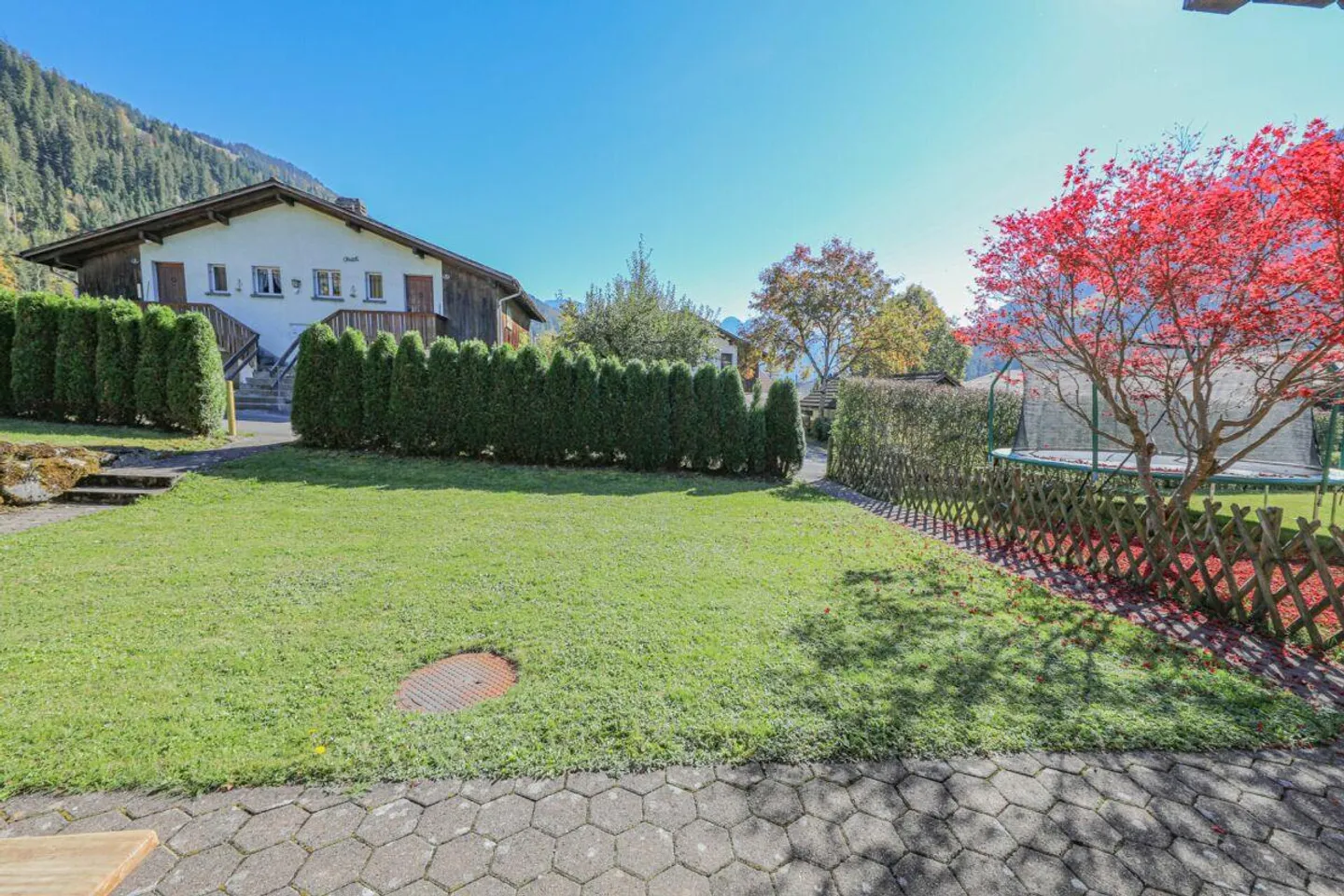 Charmant appartement de 4,5 pièces dans un chalet confortable avec jardin - Photo 10 sur 10