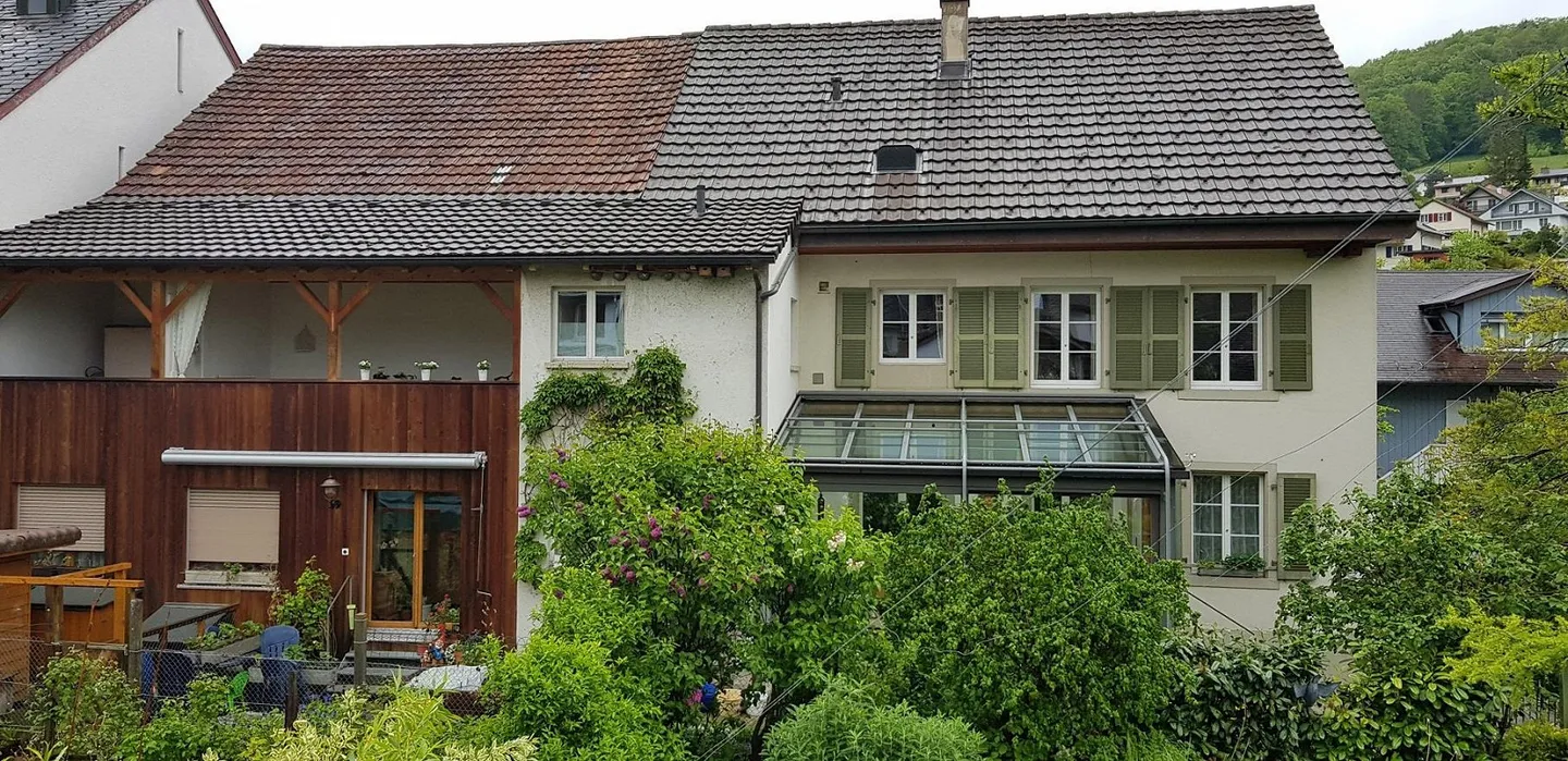 Wohnung in Zweifamilienhaus Nähe Dorfplatz - Foto 1 von 14