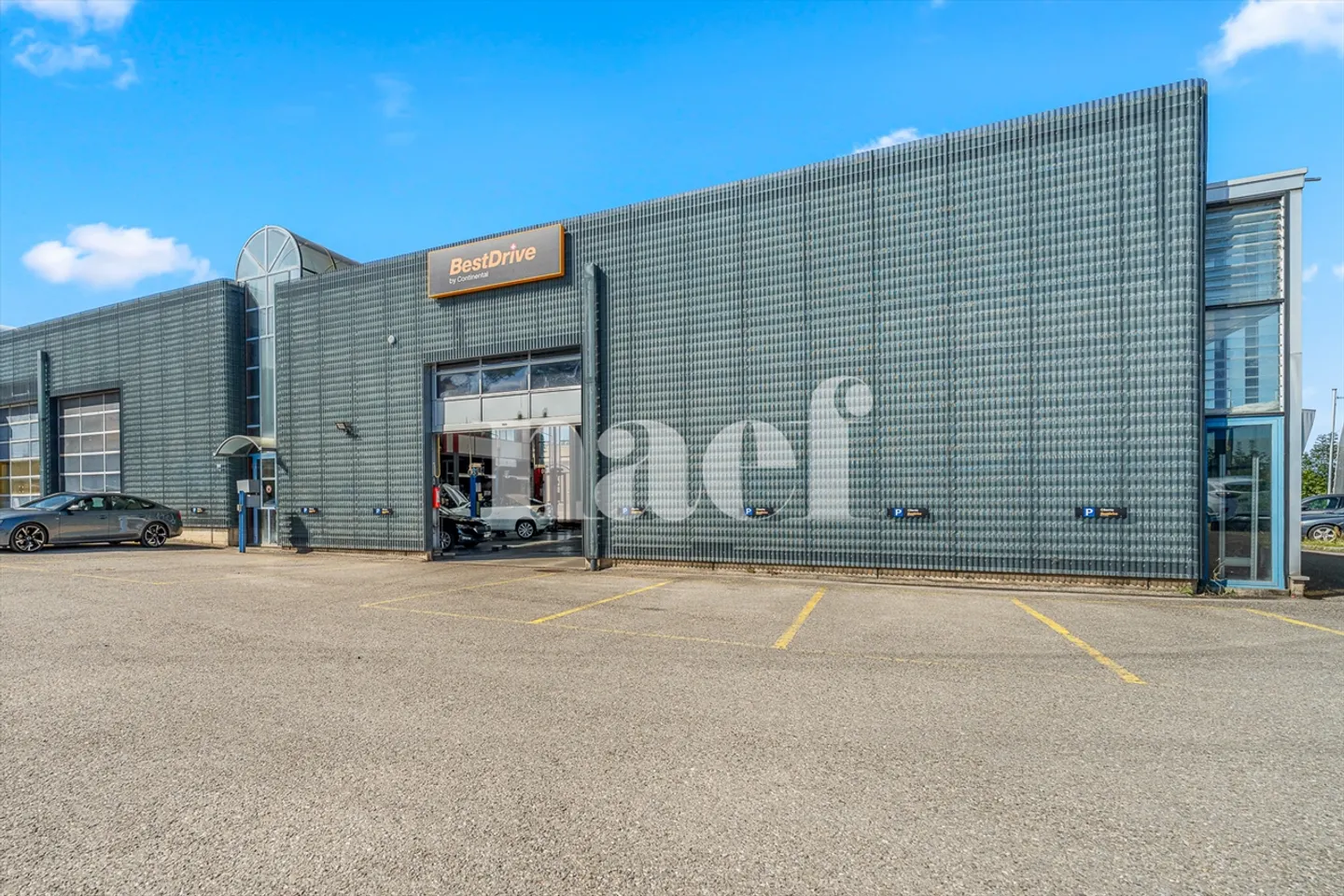 Garage with reception, workshop and storage spaces for sale in Givisiez - Photo 1 of 12