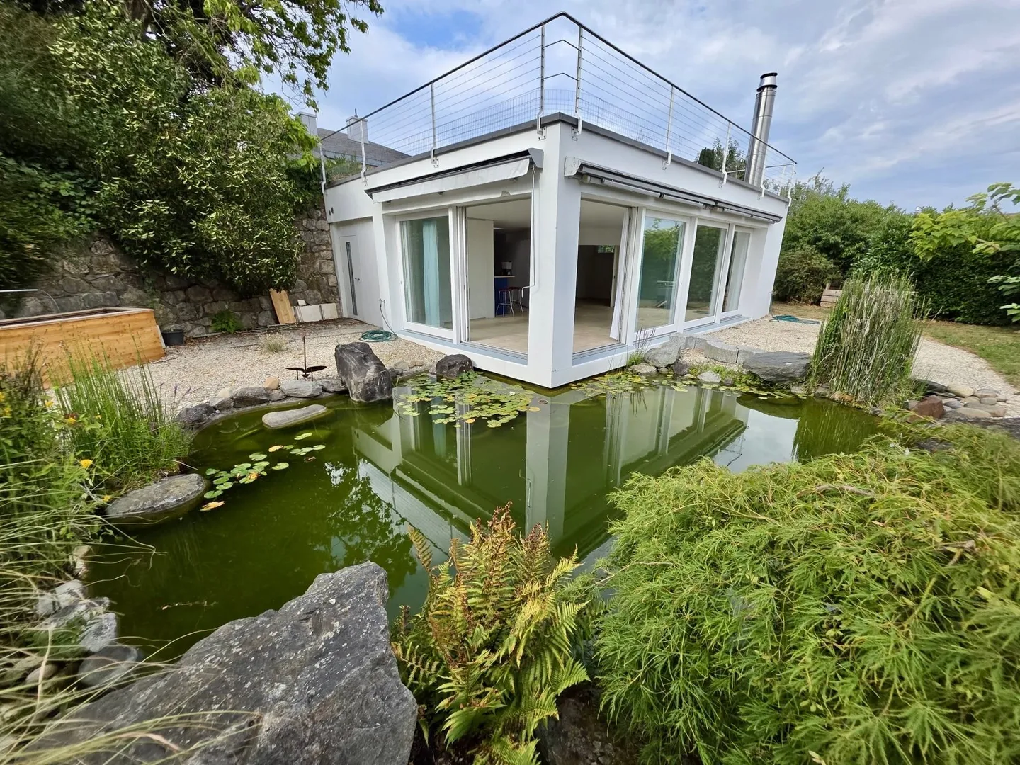 85 m² Sogno Abitativo - Idyllico Appartamento Giardino 2.5 Stanze con Stagno - Foto 2 di 10