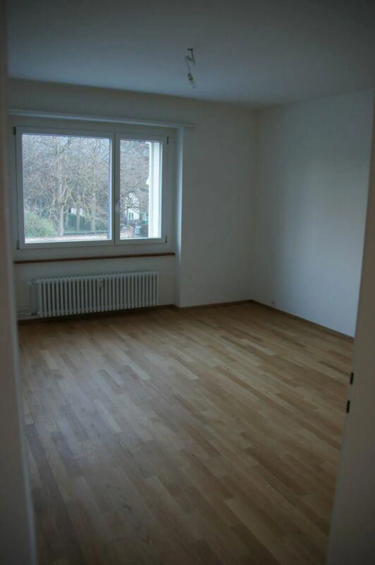 Quietly located 4.5-room apartment on the raised ground floor - Photo 5 of 11