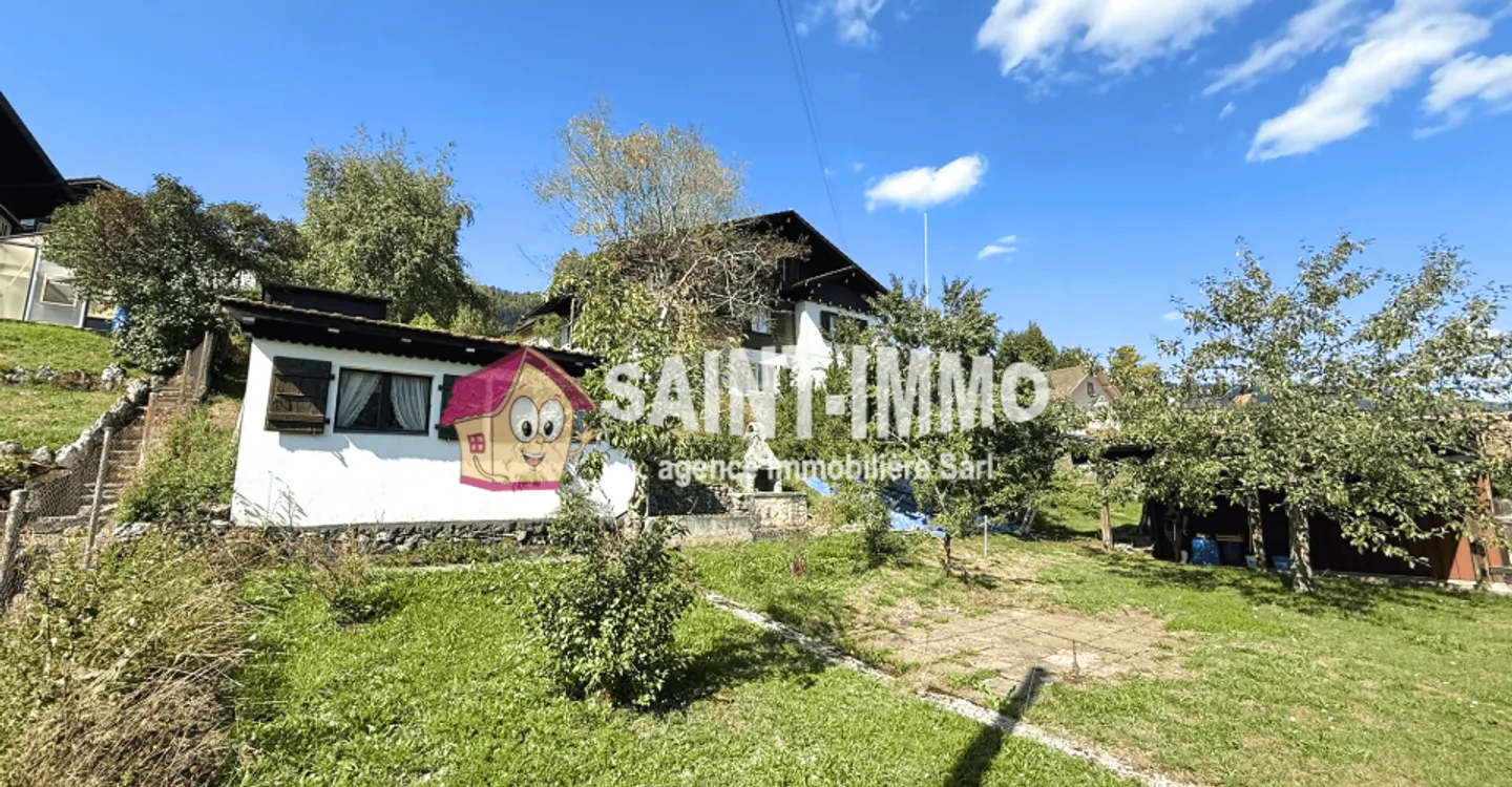 Chalet mit zwei Wohnungen (3 & 6,5 Zimmer) mit einem 840 m2 großen Garten, Terrasse und Garagen - Foto 3 von 23