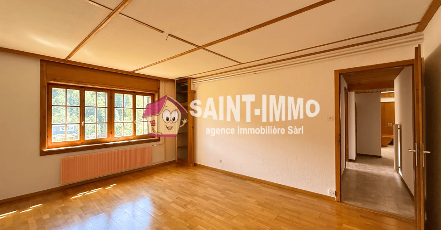 Chalet mit zwei Wohnungen (3 & 6,5 Zimmer) mit einem 840 m2 großen Garten, Terrasse und Garagen - Foto 5 von 23