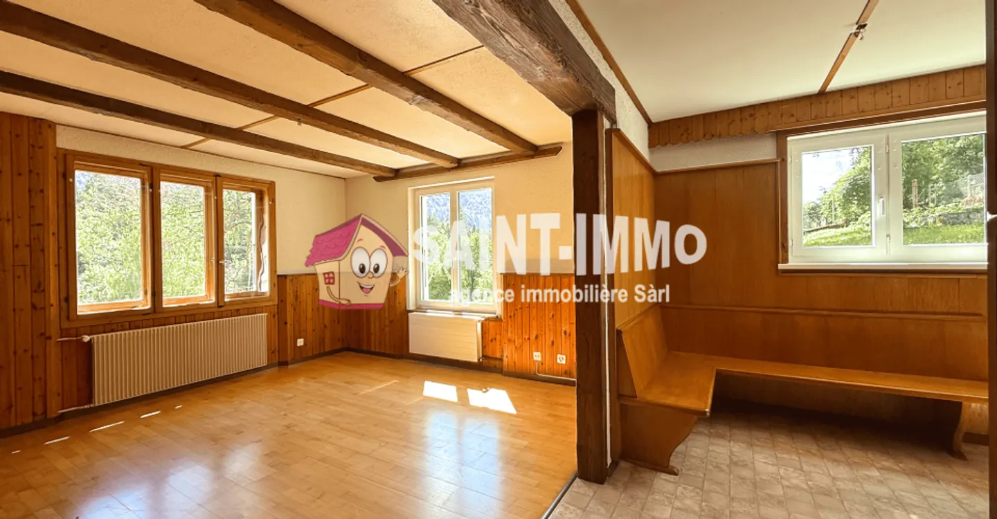 Chalet mit zwei Wohnungen (3 & 6,5 Zimmer) mit einem 840 m2 großen Garten, Terrasse und Garagen - Foto 6 von 23