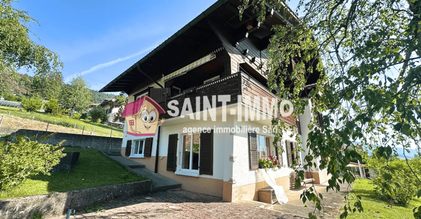 Chalet mit zwei Wohnungen (3 & 6,5 Zimmer) mit einem 840 m2 großen Garten, Terrasse und Garagen - Foto 2 von 23