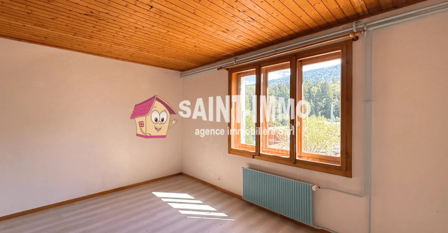 Chalet mit zwei Wohnungen (3 & 6,5 Zimmer) mit einem 840 m2 großen Garten, Terrasse und Garagen - Foto 8 von 23