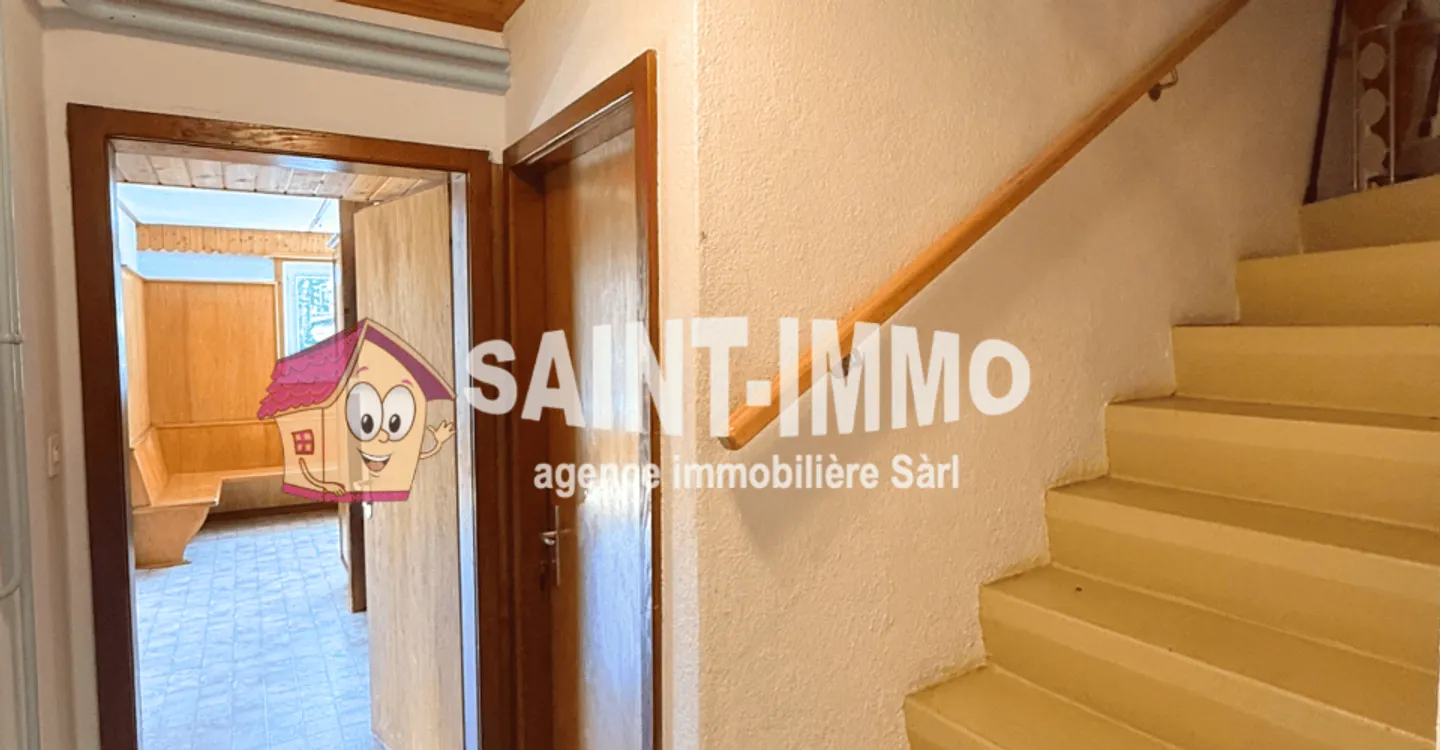 Chalet mit zwei Wohnungen (3 & 6,5 Zimmer) mit einem 840 m2 großen Garten, Terrasse und Garagen - Foto 10 von 23