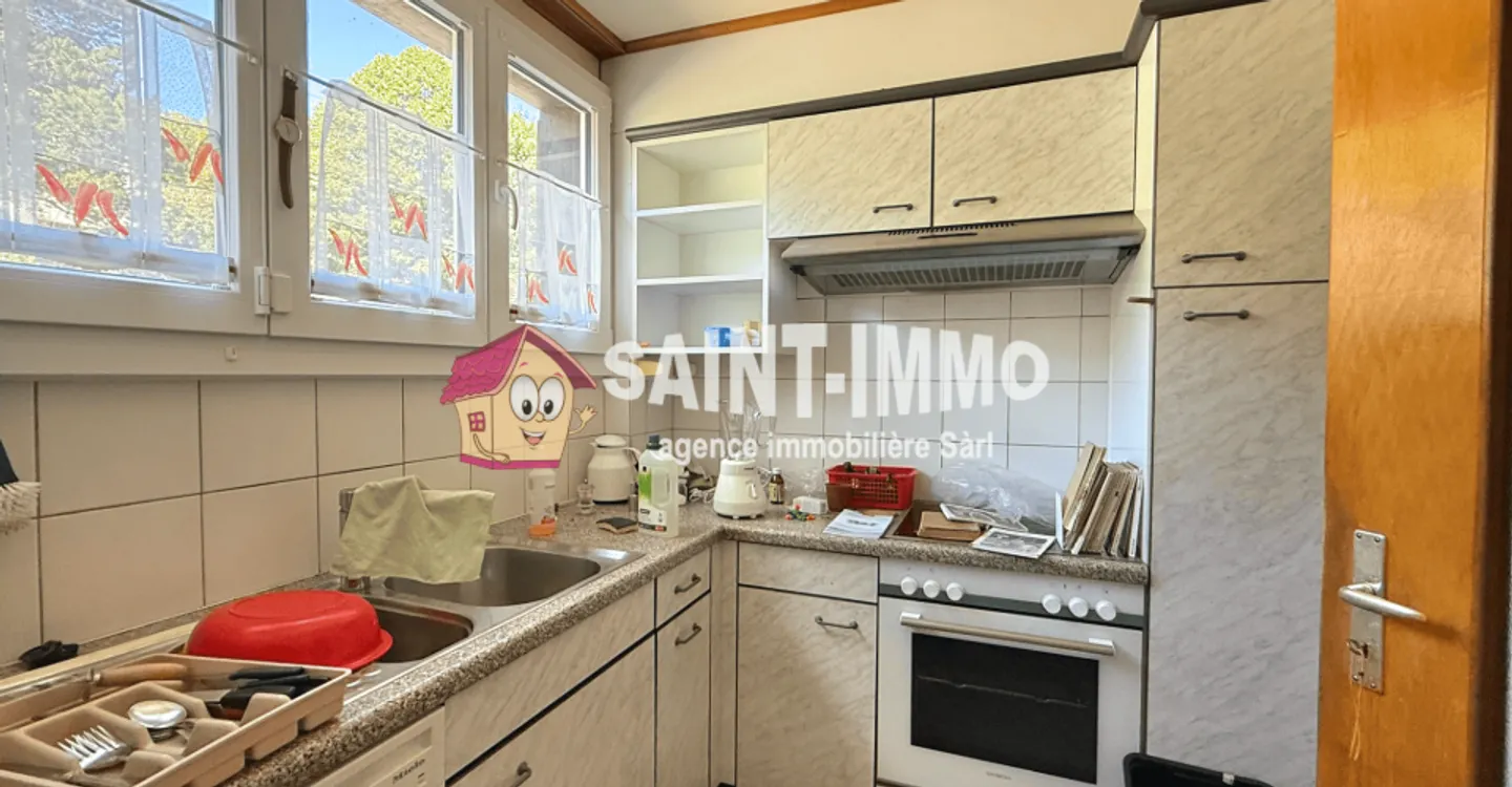 Chalet mit zwei Wohnungen (3 & 6,5 Zimmer) mit einem 840 m2 großen Garten, Terrasse und Garagen - Foto 13 von 23