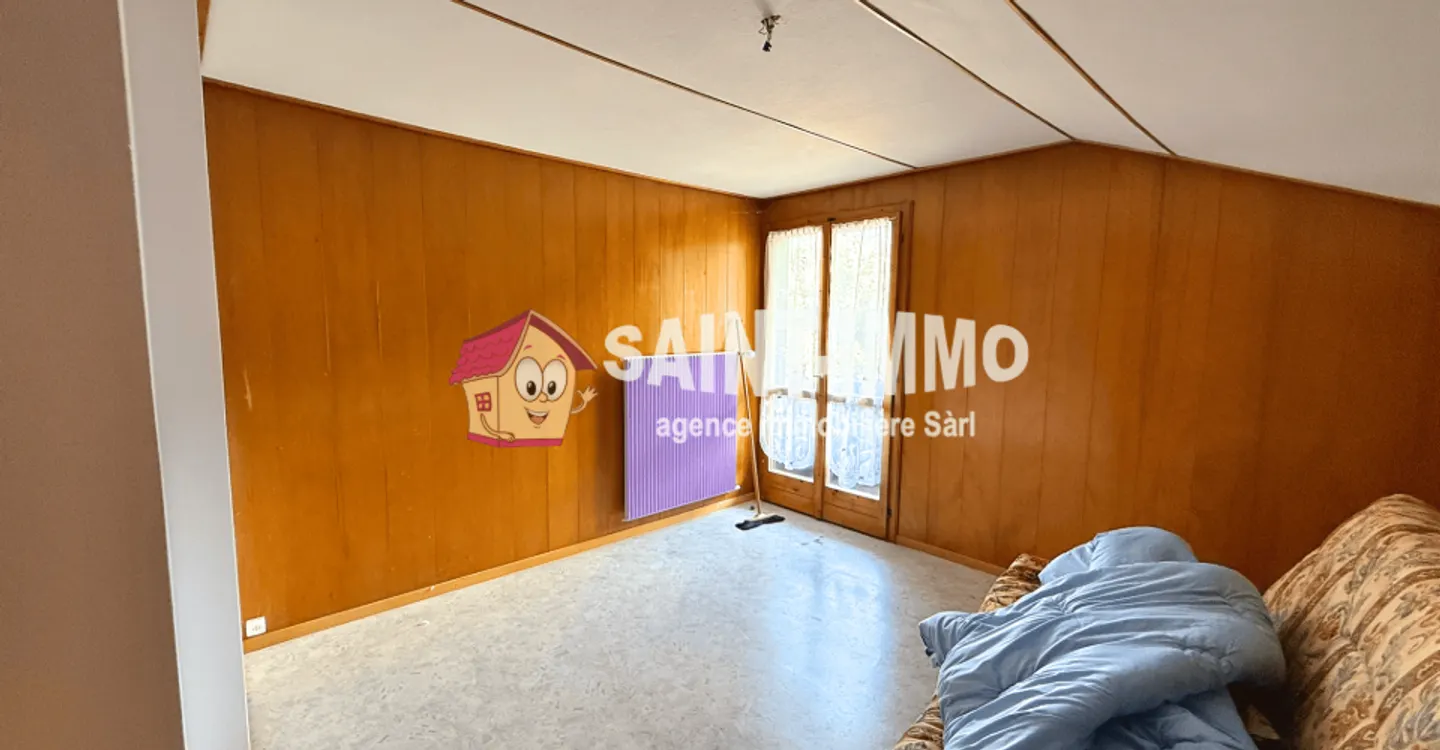 Chalet mit zwei Wohnungen (3 & 6,5 Zimmer) mit einem 840 m2 großen Garten, Terrasse und Garagen - Foto 16 von 23
