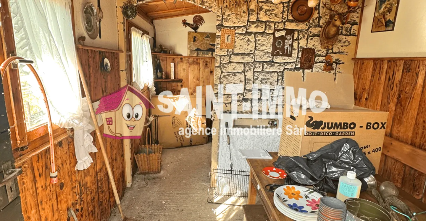 Chalet mit zwei Wohnungen (3 & 6,5 Zimmer) mit einem 840 m2 großen Garten, Terrasse und Garagen - Foto 20 von 23