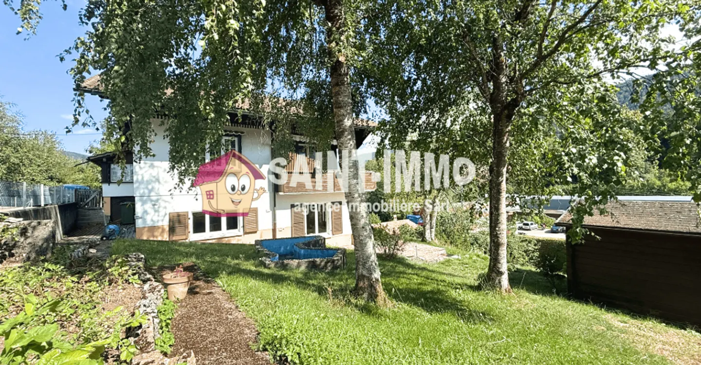 Chalet mit zwei Wohnungen (3 & 6,5 Zimmer) mit einem 840 m2 großen Garten, Terrasse und Garagen - Foto 23 von 23