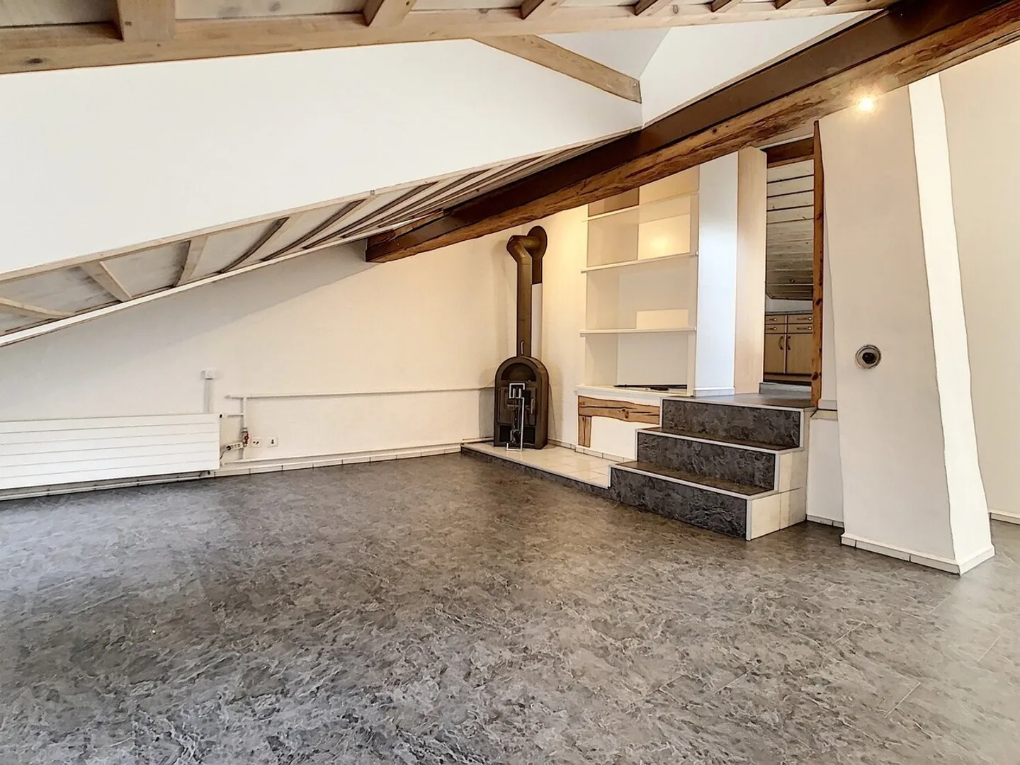 NICE ATTIC APARTMENT WITH A LOT OF CHARM! - Photo 3 of 8