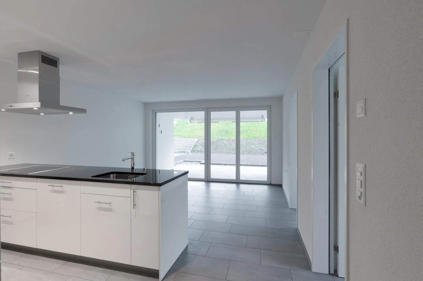 Modernes Erdgeschoss-Apartment - Foto 1 von 9