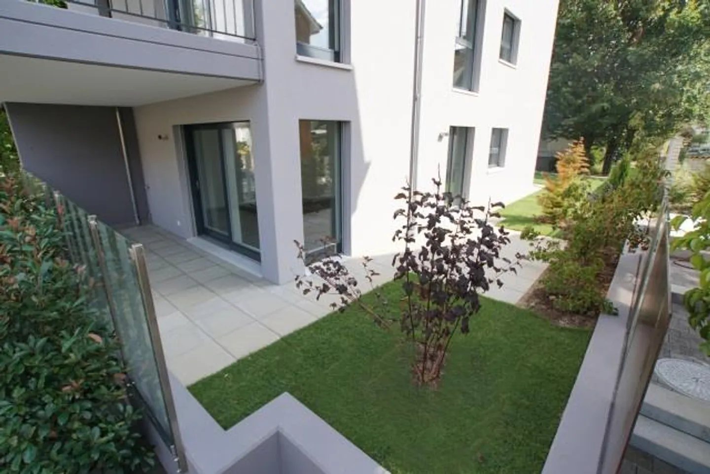 Appartamento moderno di 3,5 stanze al piano terra con un bel giardino privato - Foto 1 di 6