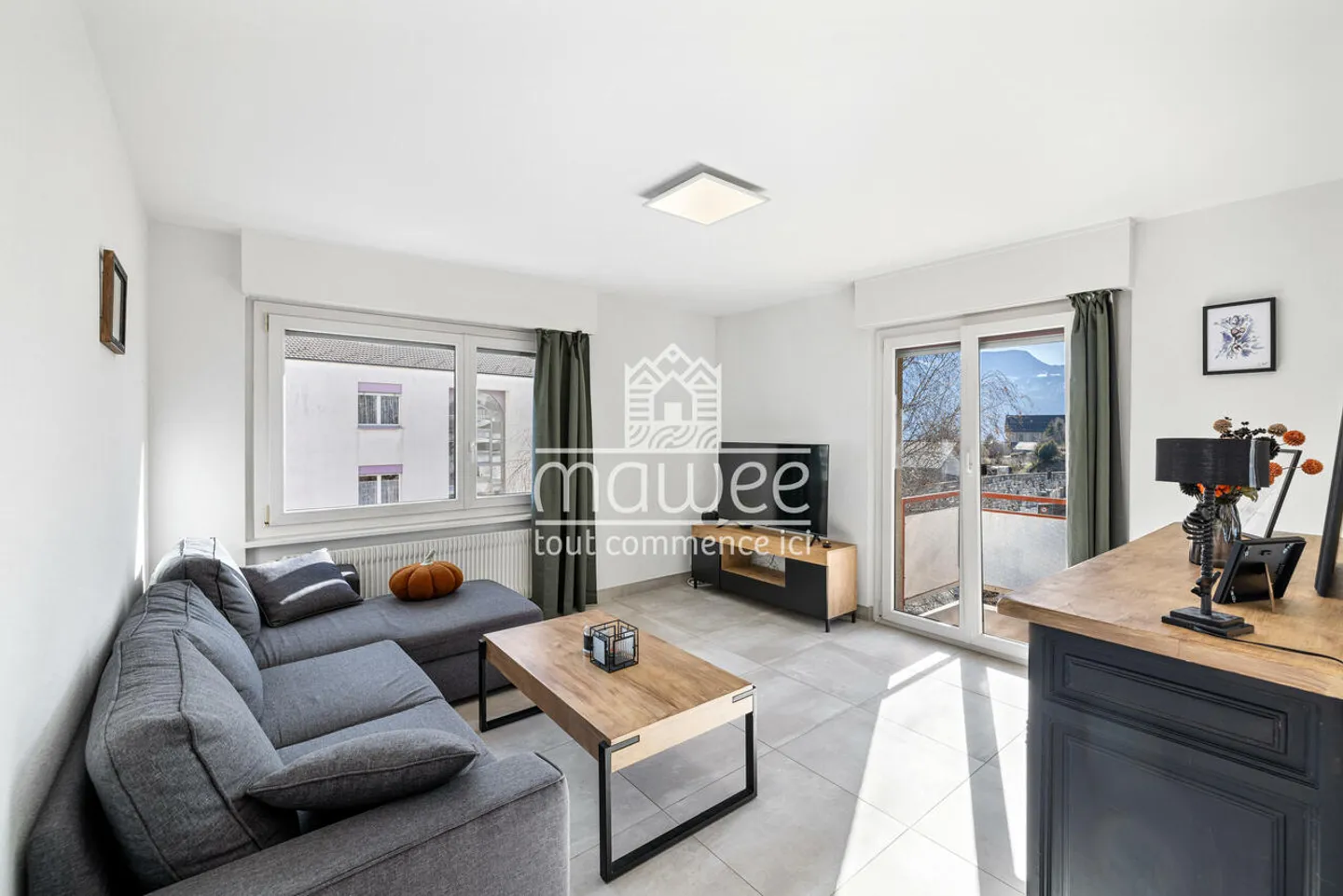 Elegant 3.5-room apartment in the heart of Chamoson - Photo 4 of 11