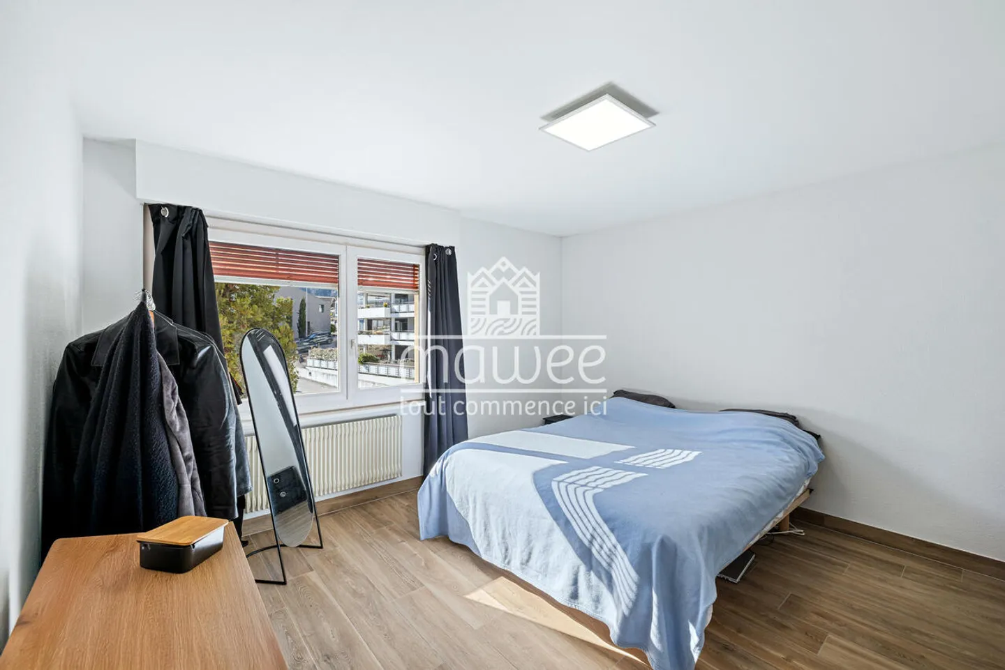 Elegant 3.5-room apartment in the heart of Chamoson - Photo 6 of 11