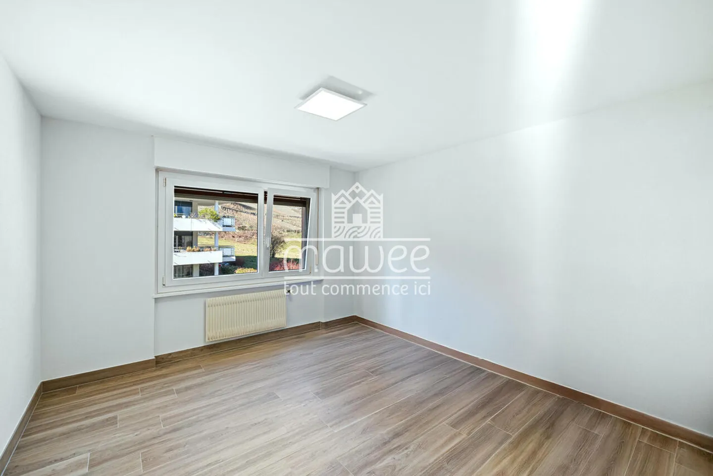 Elegant 3.5-room apartment in the heart of Chamoson - Photo 8 of 11