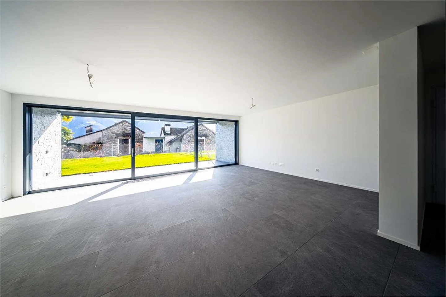 Appartamento 3,5 locali con giardino NUOVO Minusio vista lago al piano terra - Foto 10 di 13
